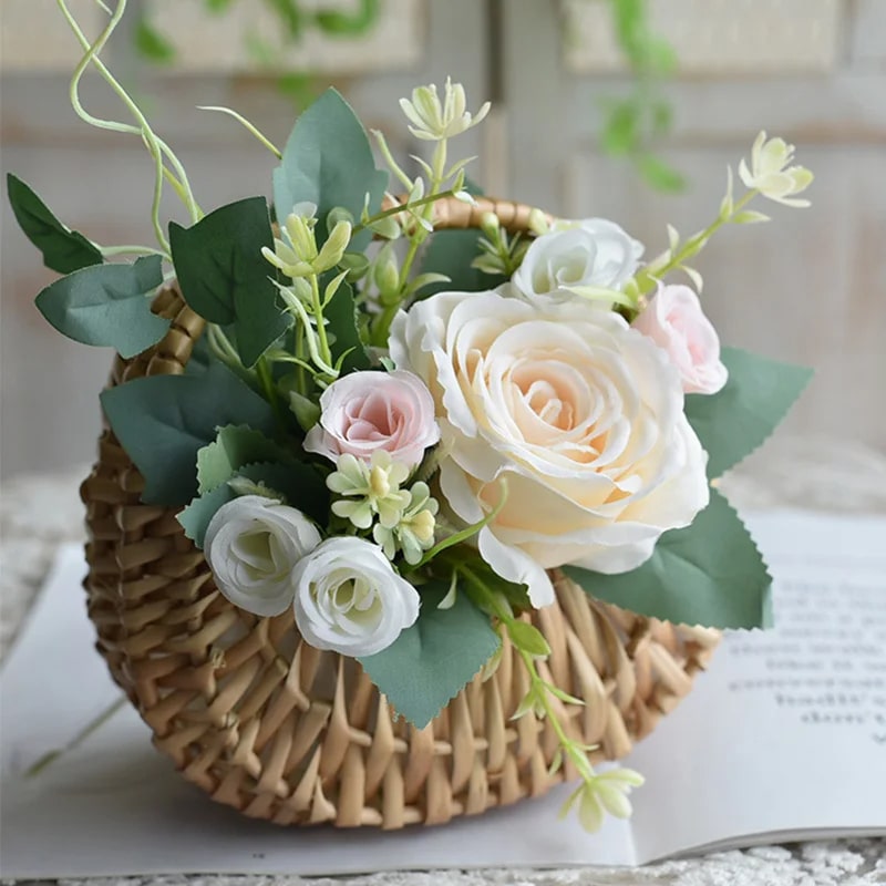 Small half-moon wicker-look basket with a braided handle – shown in a room setting