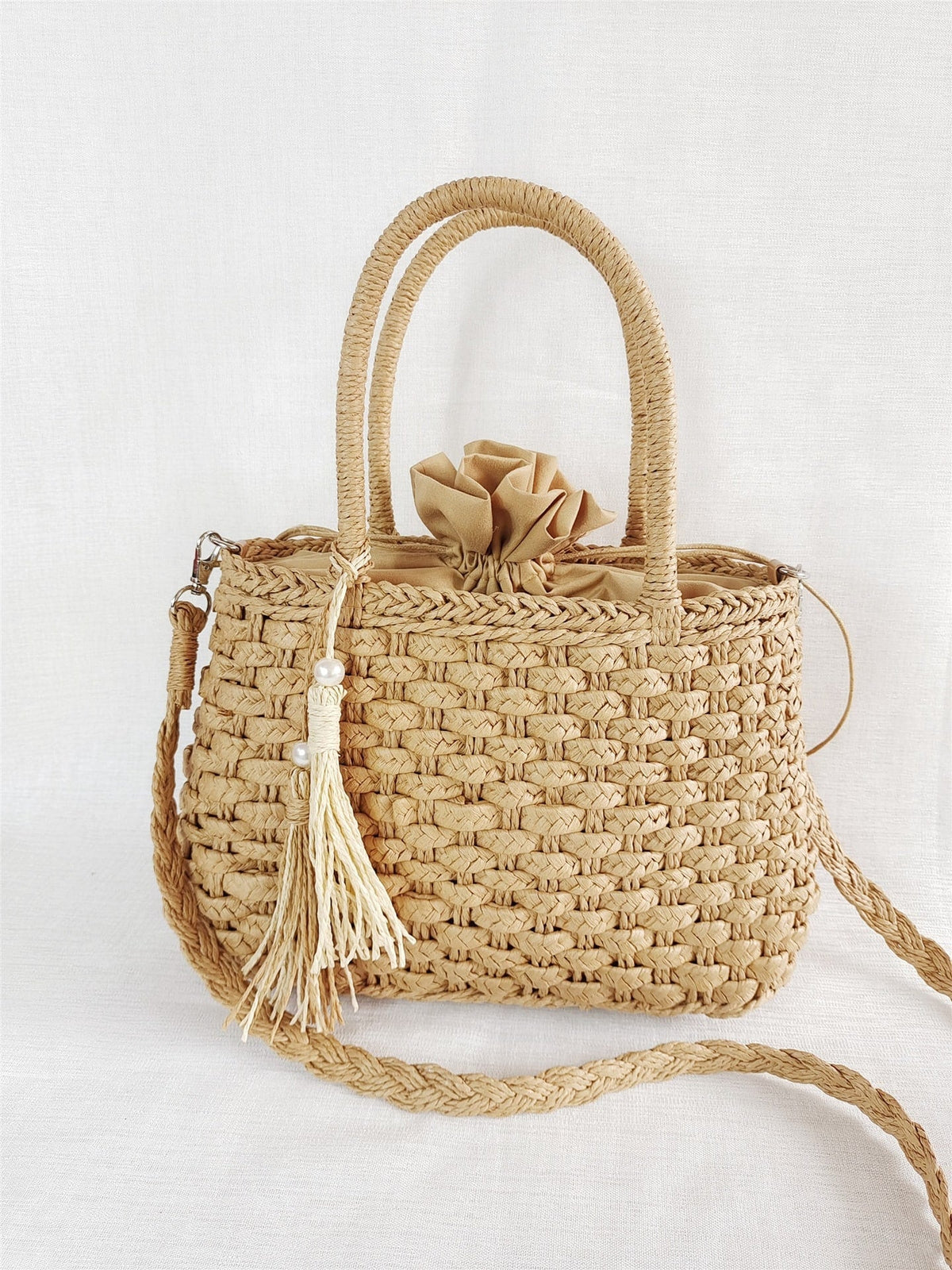 Small rattan handbag with rigid handles and a removable strap – brown variant, another view