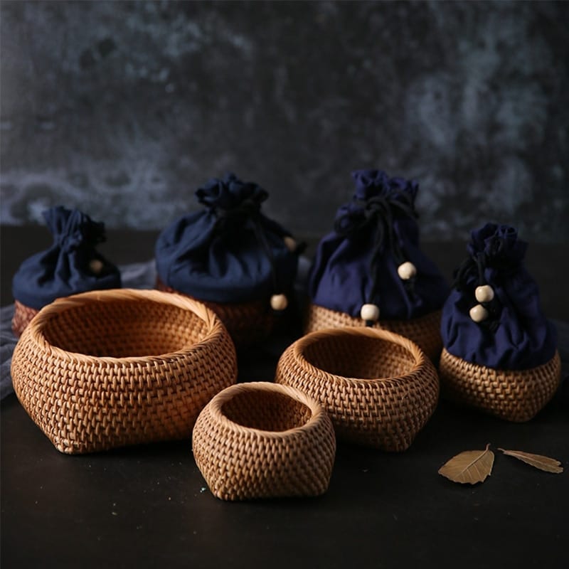 Small openwork natural rattan storage box – shown in a room setting