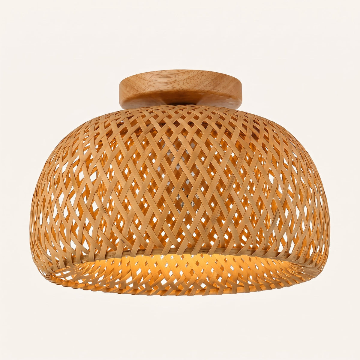 Woven bamboo dome flush mount light on a solid wood canopy