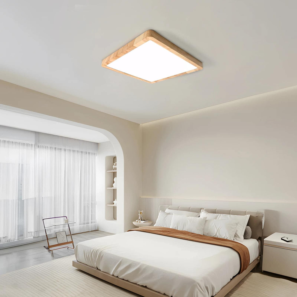 Square wood frame LED ceiling light in Scandinavian style – shown lit in a room setting