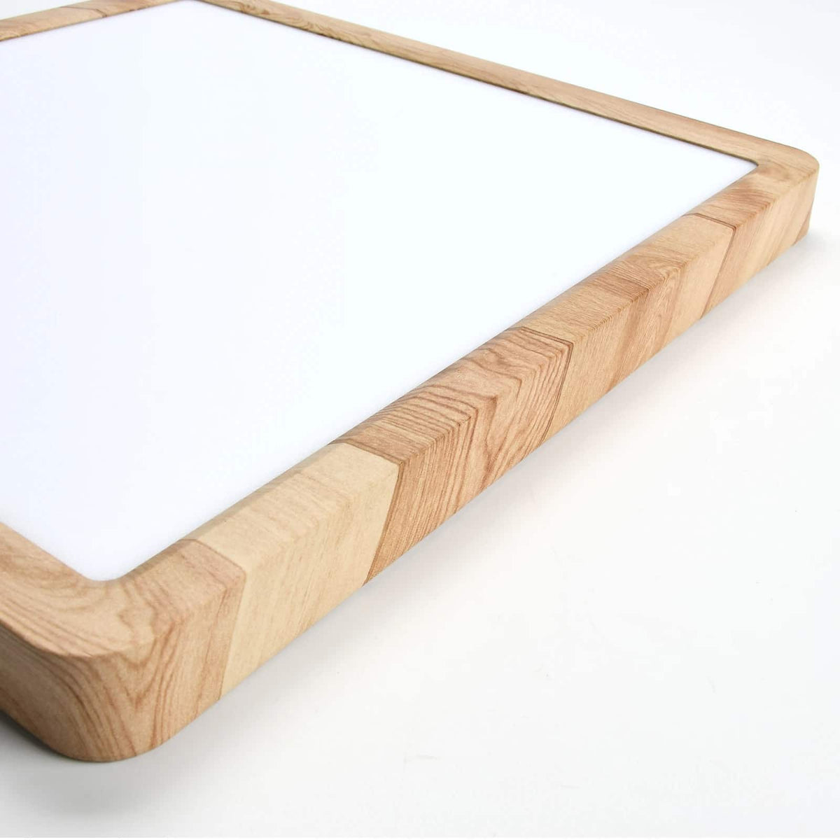 Square wood frame LED ceiling light in Scandinavian style – close-up detail