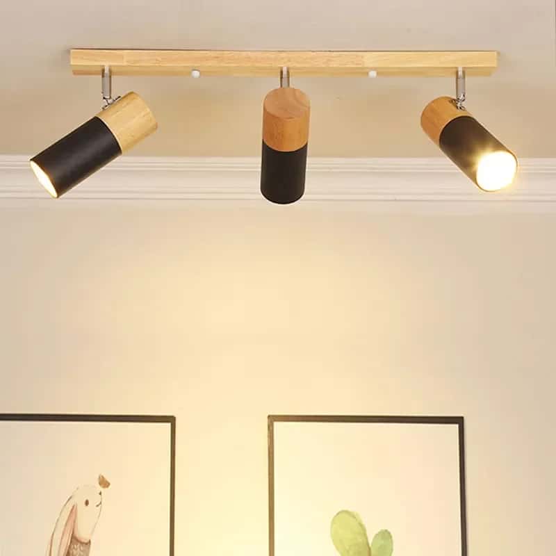 Three-head wood and metal LED ceiling spotlight – shown lit in a room setting (2)