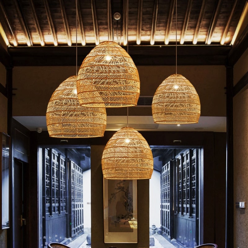 Adjustable-height vintage rattan LED ceiling light – shown lit in a room setting