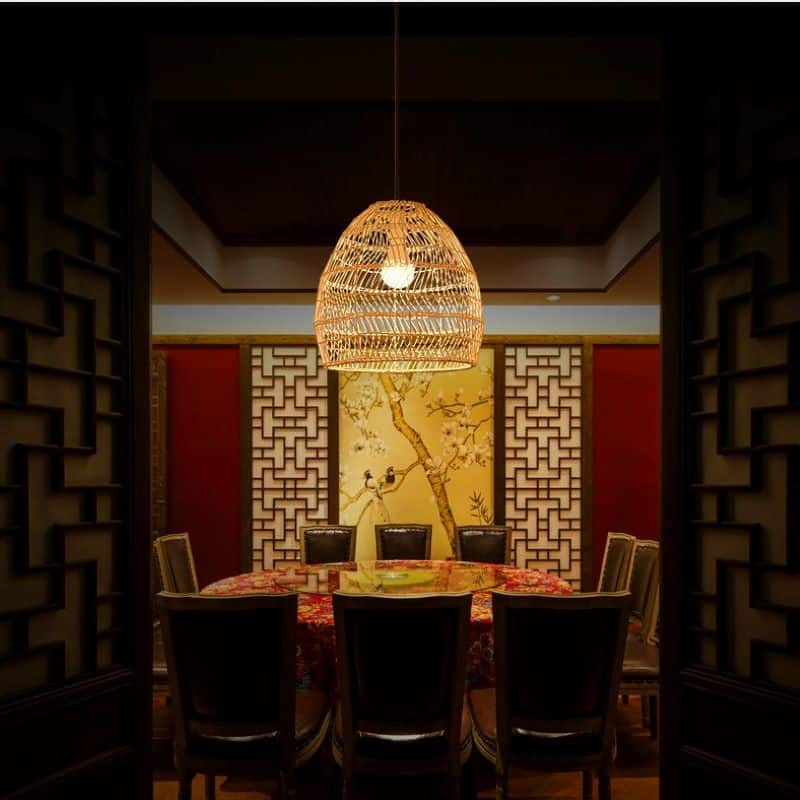 Adjustable-height vintage rattan LED ceiling light – shown lit in a room setting (3)
