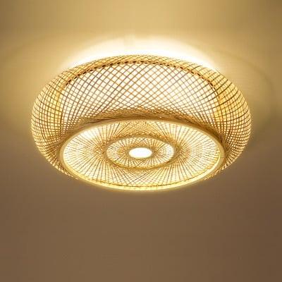 Open-weave hanging rattan ceiling light – M variant, close-up detail, lit