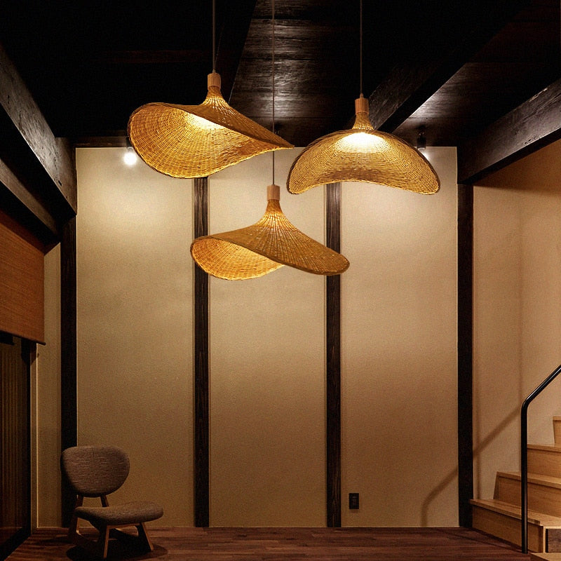 Vietnamese-style handwoven rattan and bamboo ceiling light – shown lit in a room setting (3)