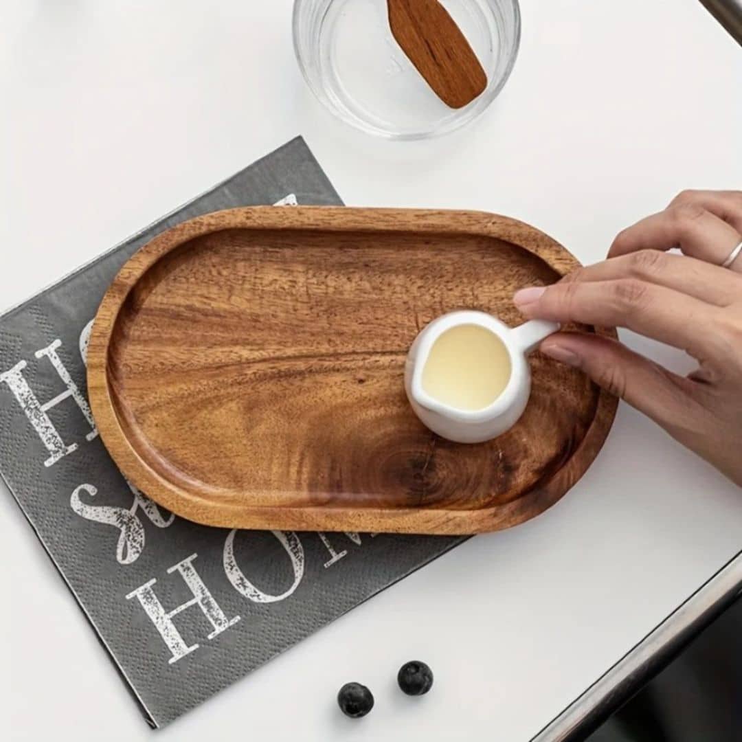 Rustic oval woven bamboo platter with braided rims – shown in use