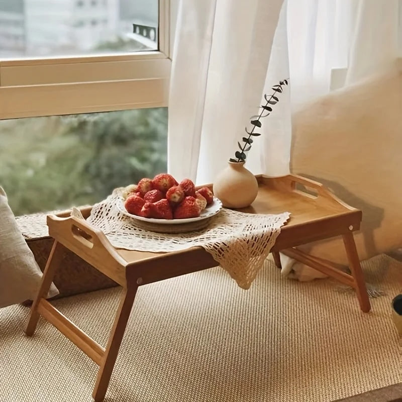 Bamboo tray with legs and side handles – shown in a room setting