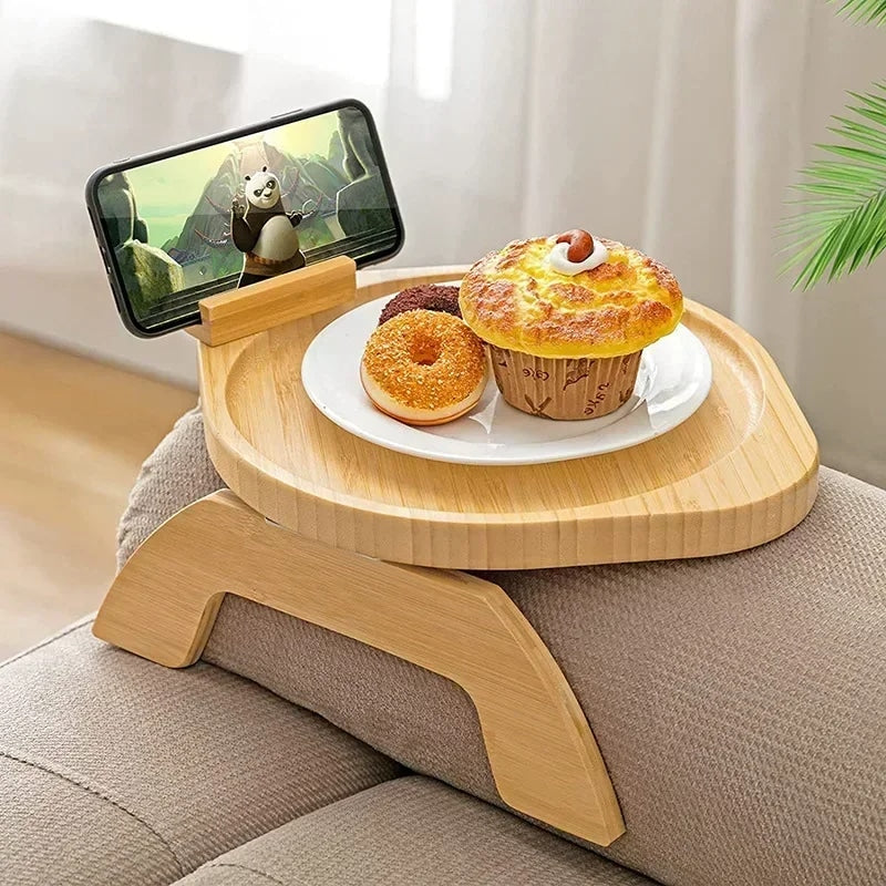 Foldable bamboo bed tray with a tilting phone holder – shown in a room setting (2)