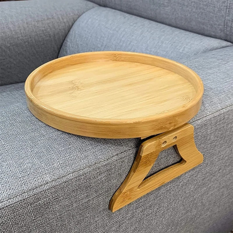 Round bamboo tray resting on a sofa armrest – shown in a room setting