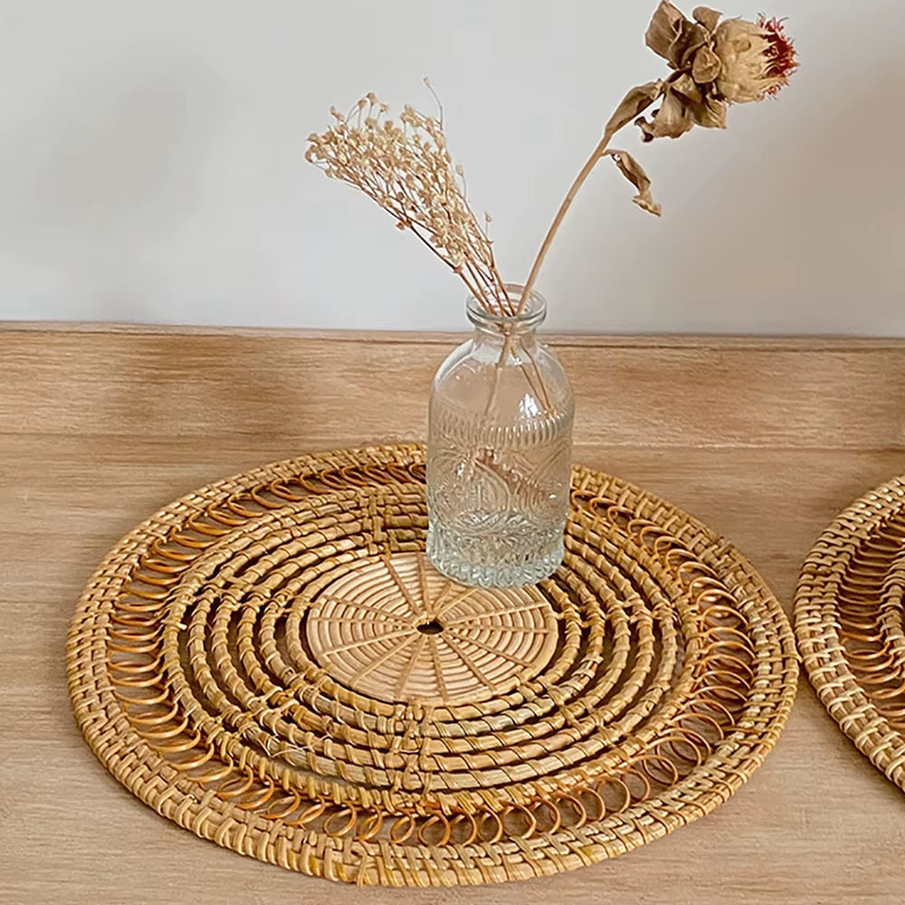 Round pastoral rattan decorative tray in a golden tone – shown in a room setting (2)
