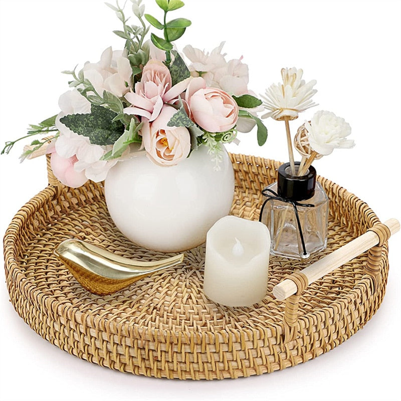Light beige rattan serving tray with solid wood handles – shown in a room setting (2)