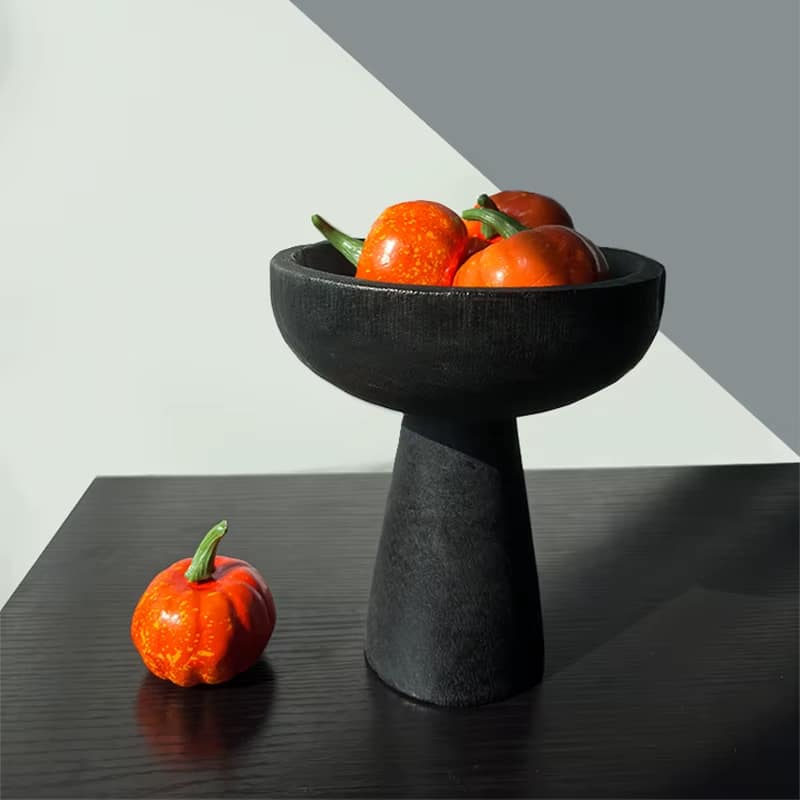 Footed fruit stand with a wood base and hand-braided rattan tray – another view