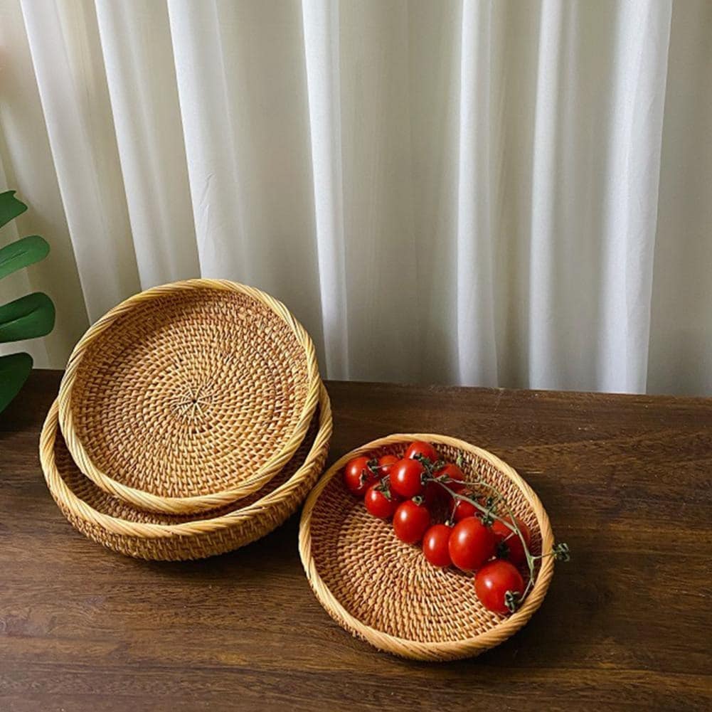 Round genuine rattan tray with natural ribs and a rounded border – shown in a room setting (3)