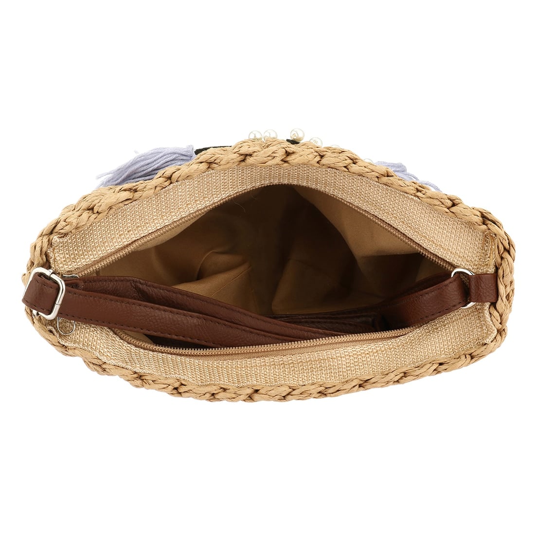 Woven rattan clutch with a cat motif – close-up detail