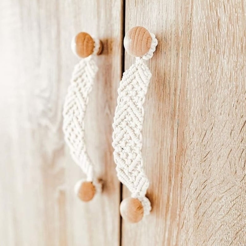Arched handwoven rattan cabinet handle – close-up detail