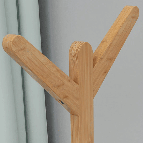 Tree branch wooden coat rack with multiple forks – close-up detail