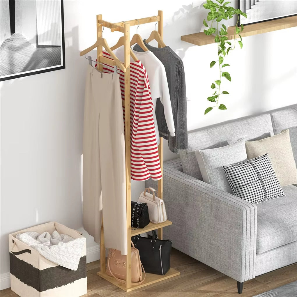 Sturdy vertical bamboo coat rack in warm beige – shown in a room setting (2)