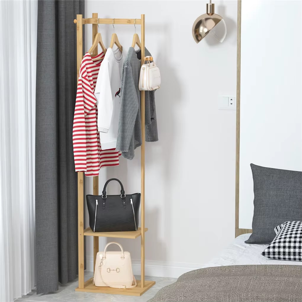 Sturdy vertical bamboo coat rack in warm beige – shown in a room setting (3)