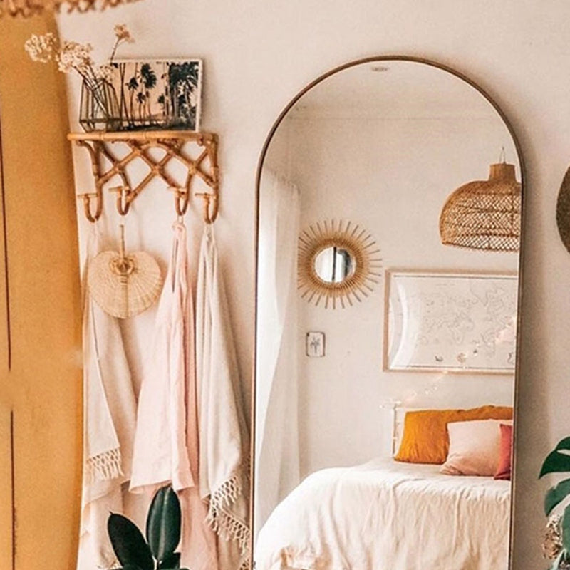 Crossed rattan wall coat rack with a top shelf and four hooks – shown in a room setting (3)