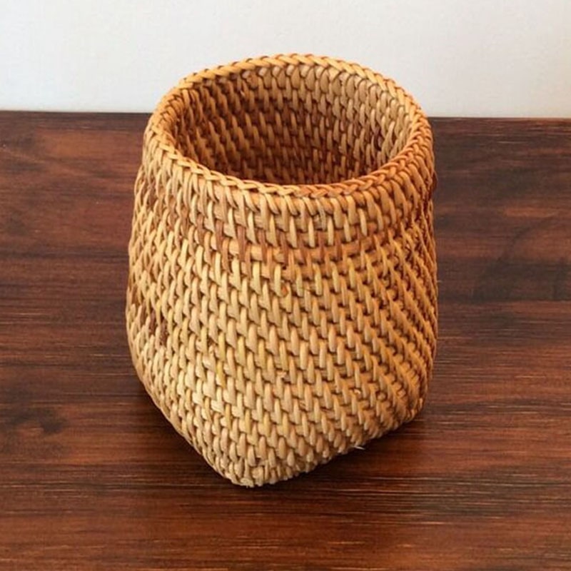Square hand-braided rattan utensil holder – shown in a room setting