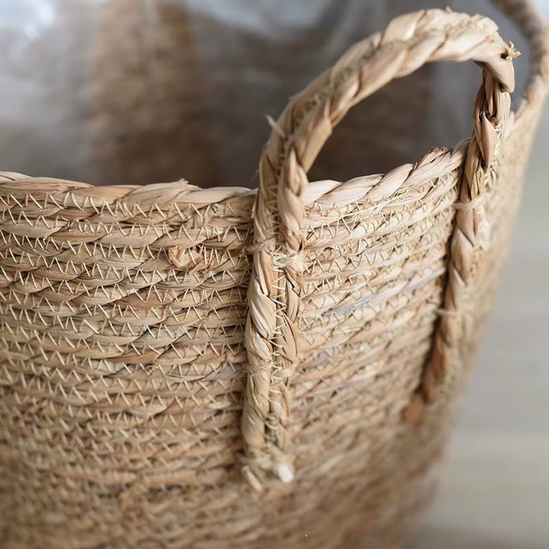 Handcrafted rattan planter with side handles – close-up detail