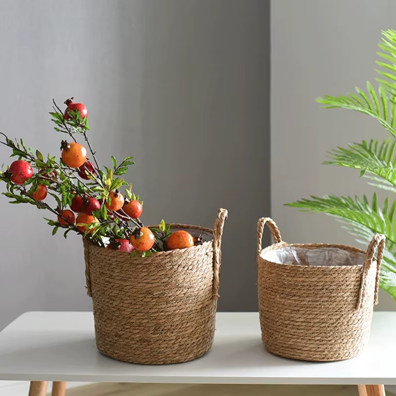Handcrafted rattan planter with side handles – shown in a room setting
