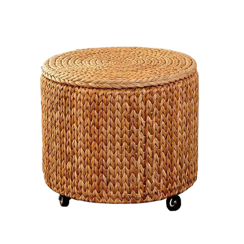 Rattan storage ottoman on casters with a lid