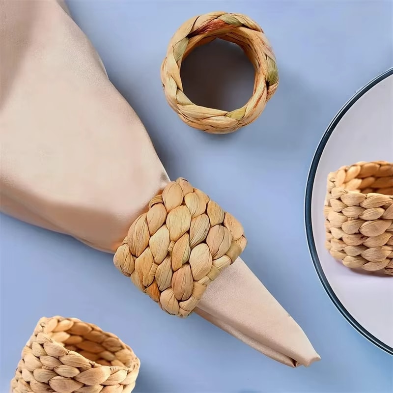 Braided golden raw rattan napkin ring – close-up detail