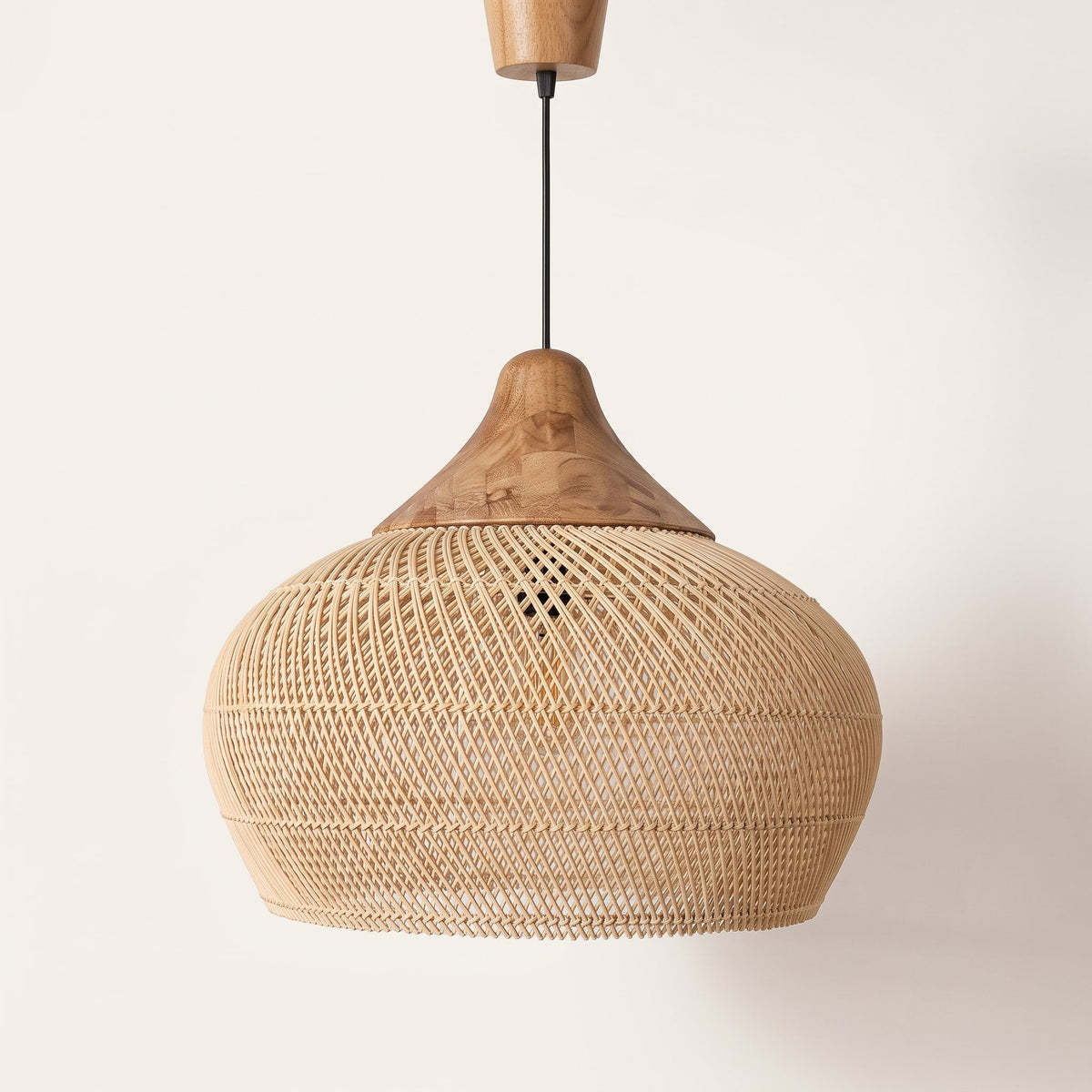 Rounded rattan pendant light with wood cap