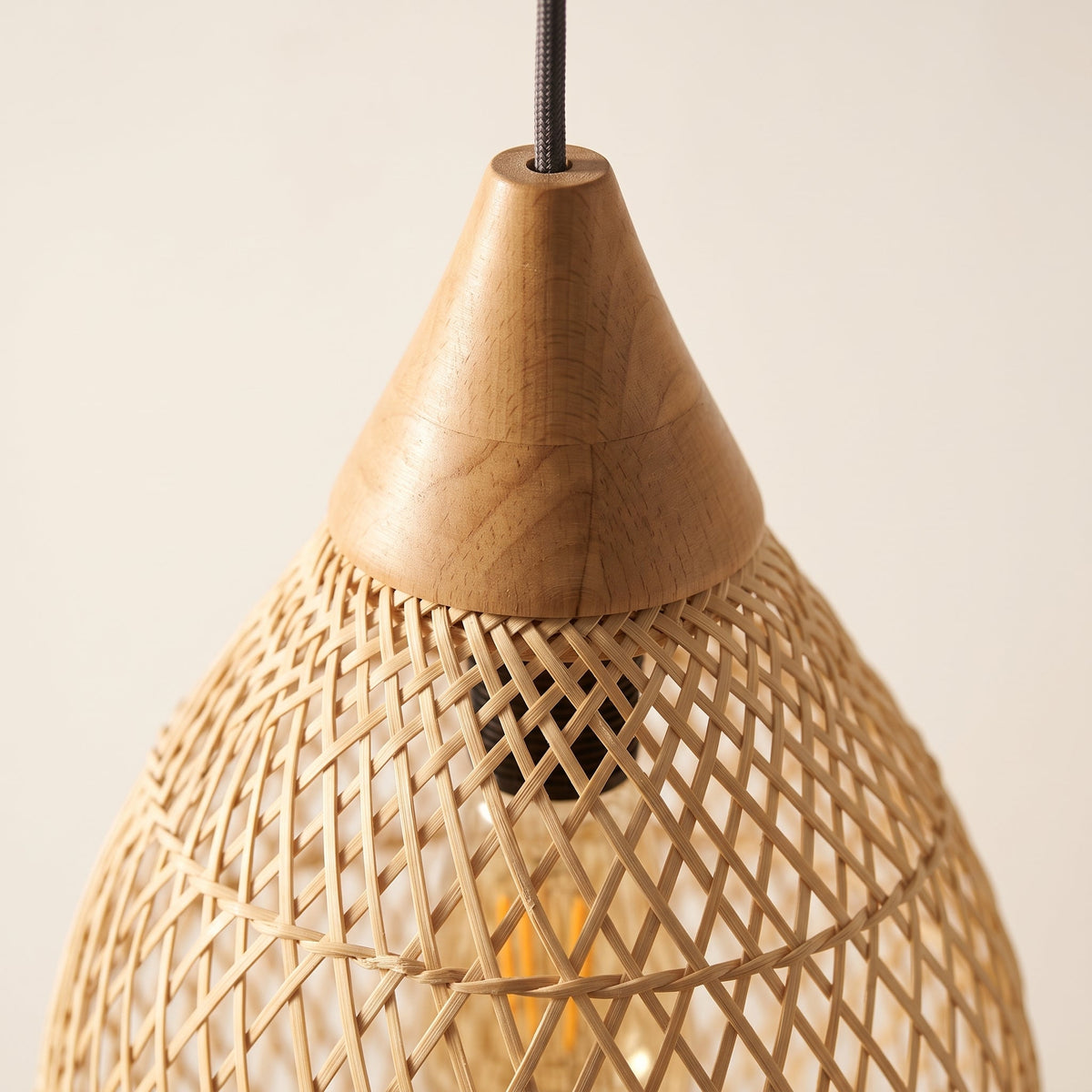 Tall rattan drop pendant light with wood cap – close-up detail