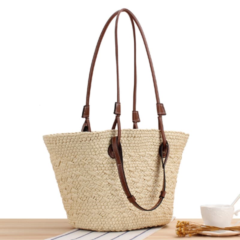 Handwoven straw handbag with two-tone brown handles – another view