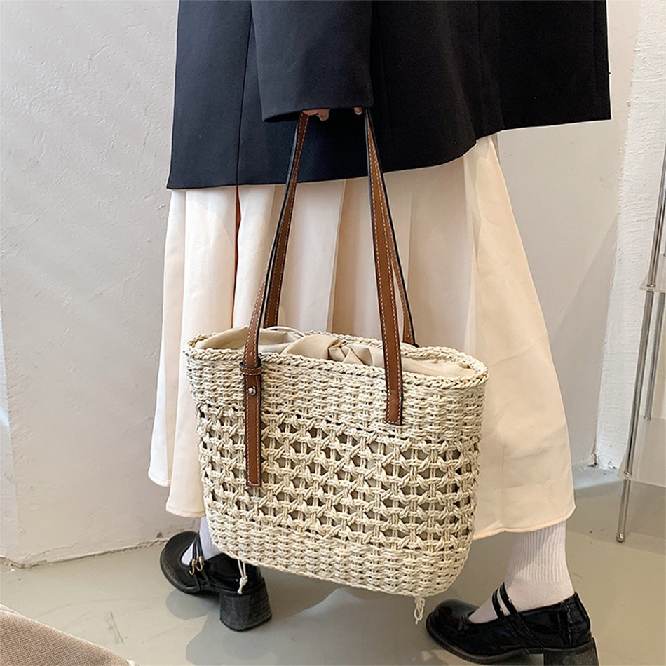 Beige golden straw beach handbag – worn by a model (4)
