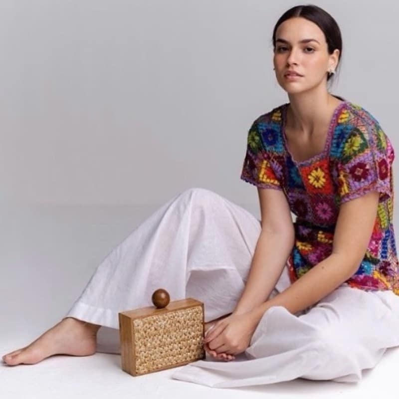 Vintage square rattan handbag – worn by a model