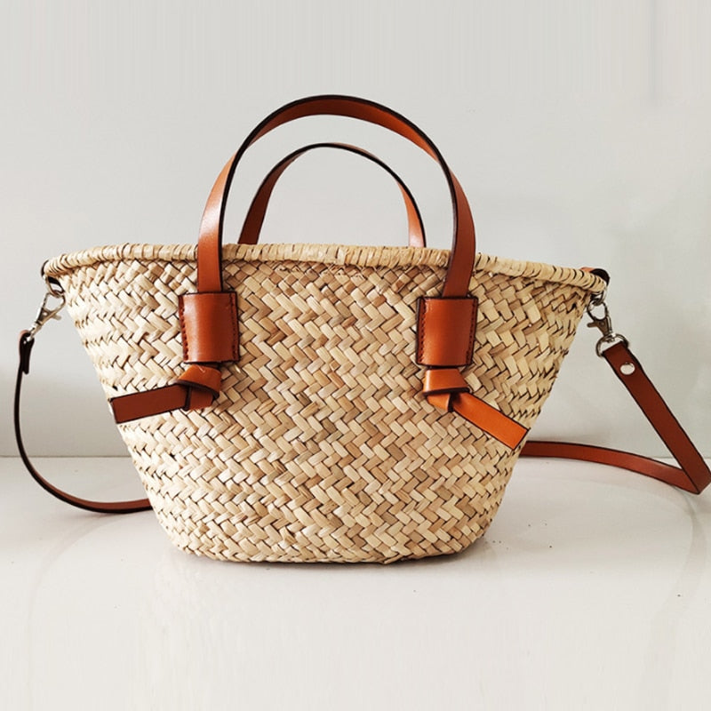 Large straw summer handbag with a camel strap