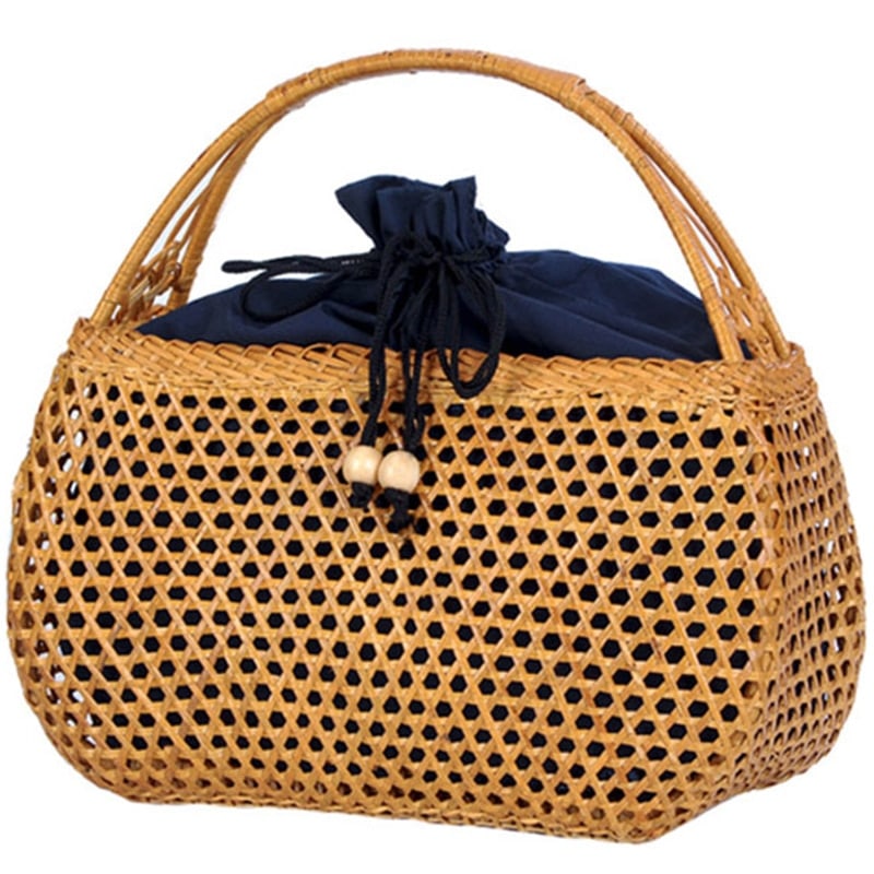Honey rattan handbag with varnished wooden handles