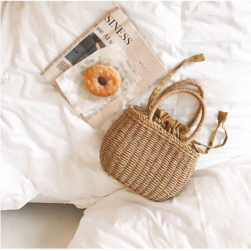 Structured handwoven rattan bag – shown in a room setting