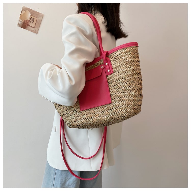 Large handmade yellow straw summer bag – worn by a model