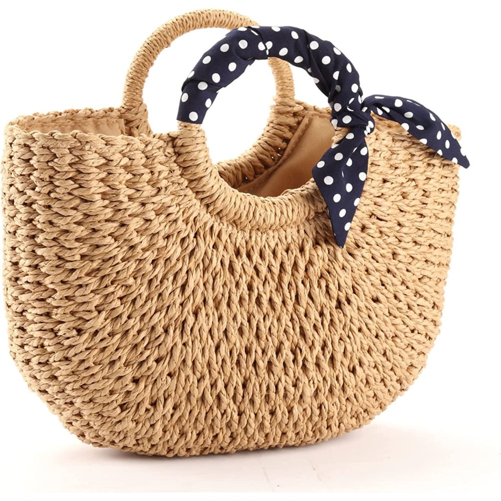 Rattan beach bag with a navy polka-dot scarf handle
