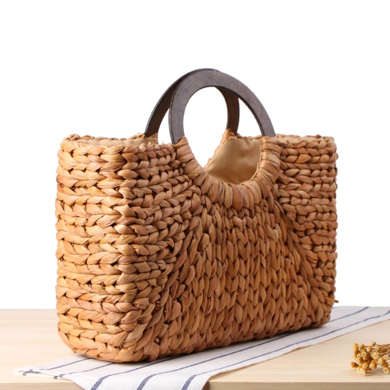 Handmade rattan beach bag with outer pockets