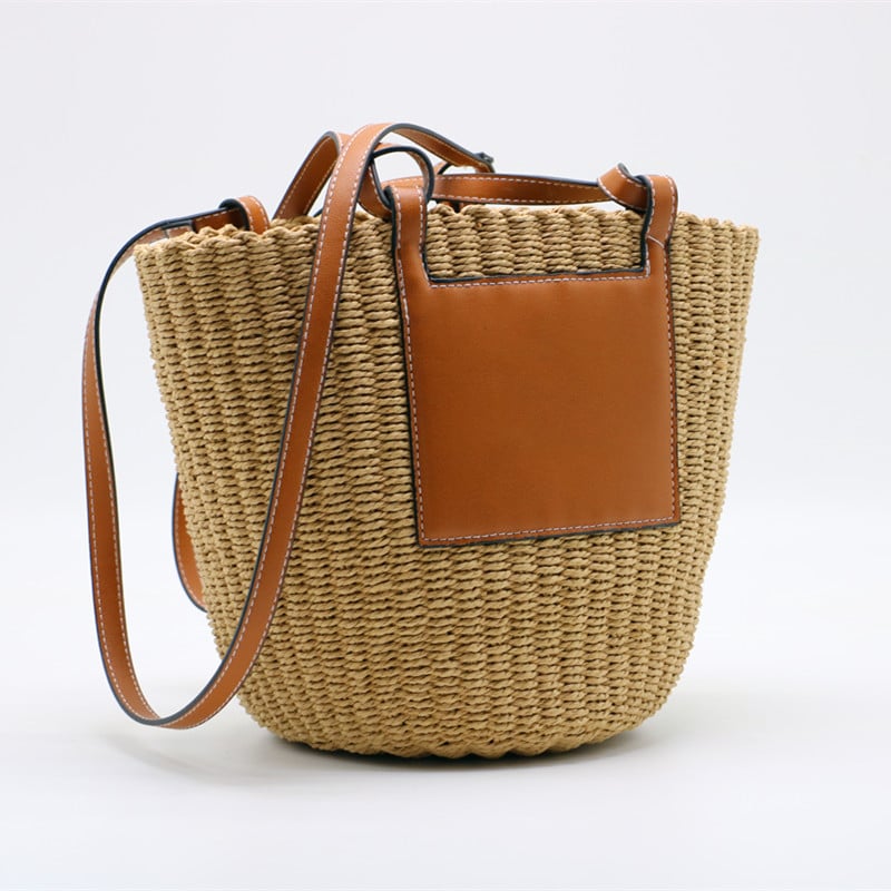 Large straw crossbody bag with a natural-tone strap – another view