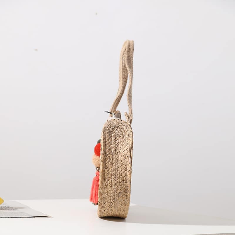Round woven crossbody bag with a long strap – another view (2)