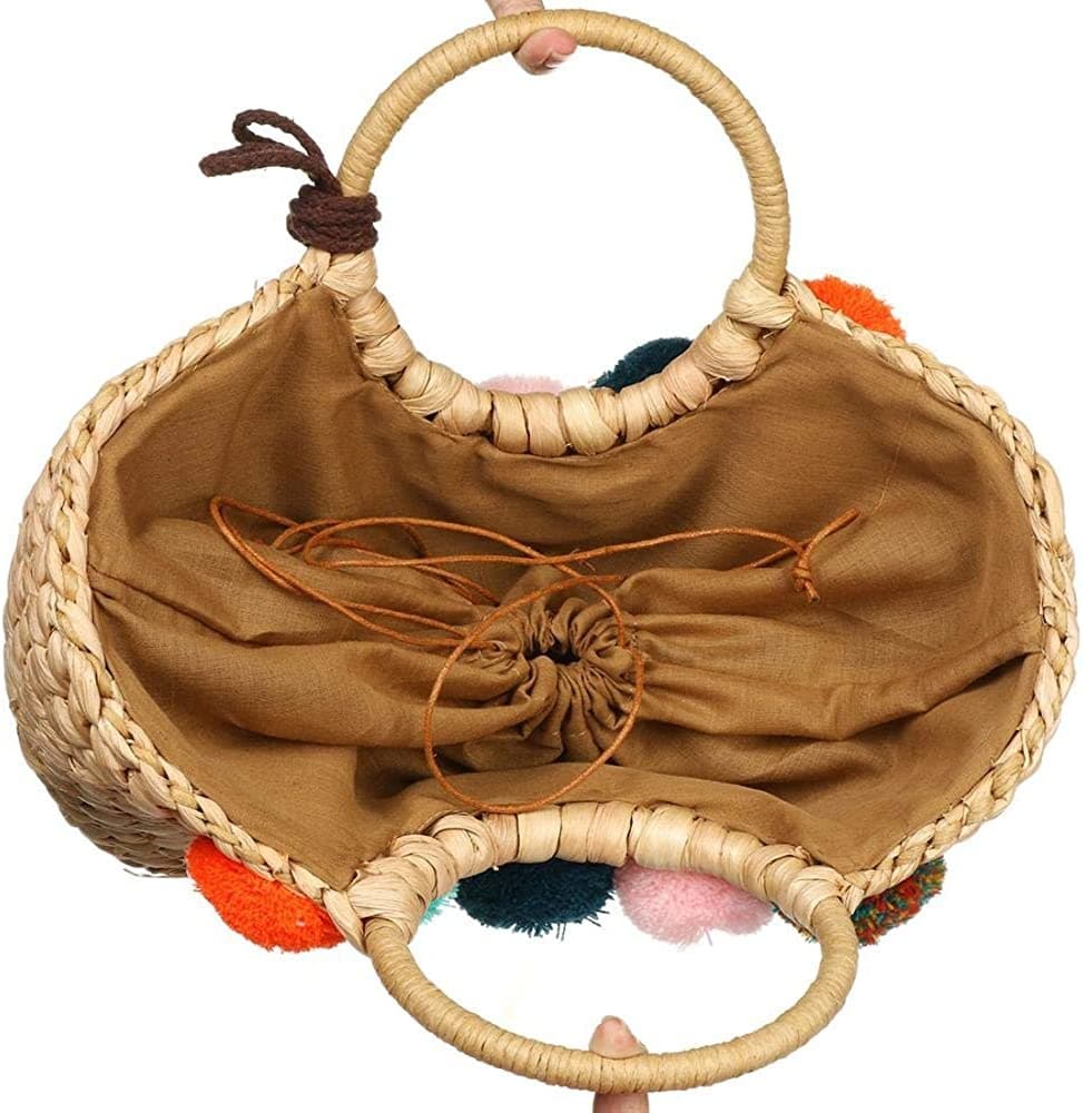 Rattan-look woven bag with multicolor pom-poms – close-up detail (2)