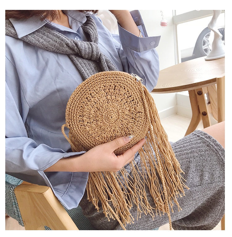 Boho crossed-weave rattan crossbody bag – brown variant, worn by a model
