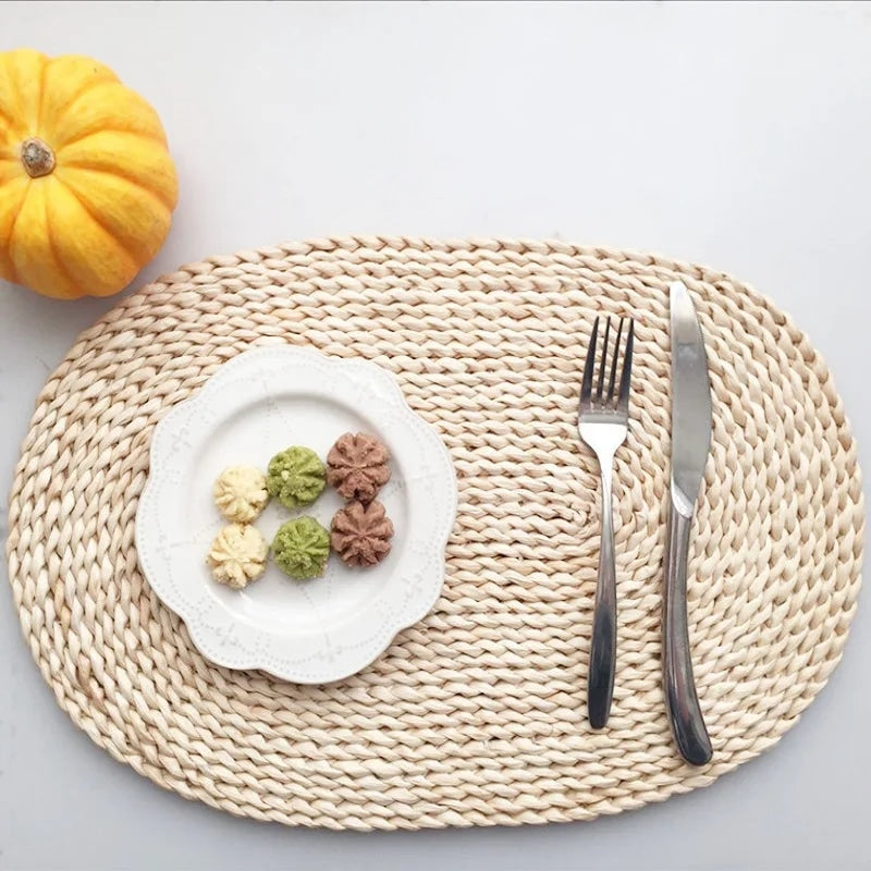 Oval hand-braided corn husk placemat – shown in a room setting