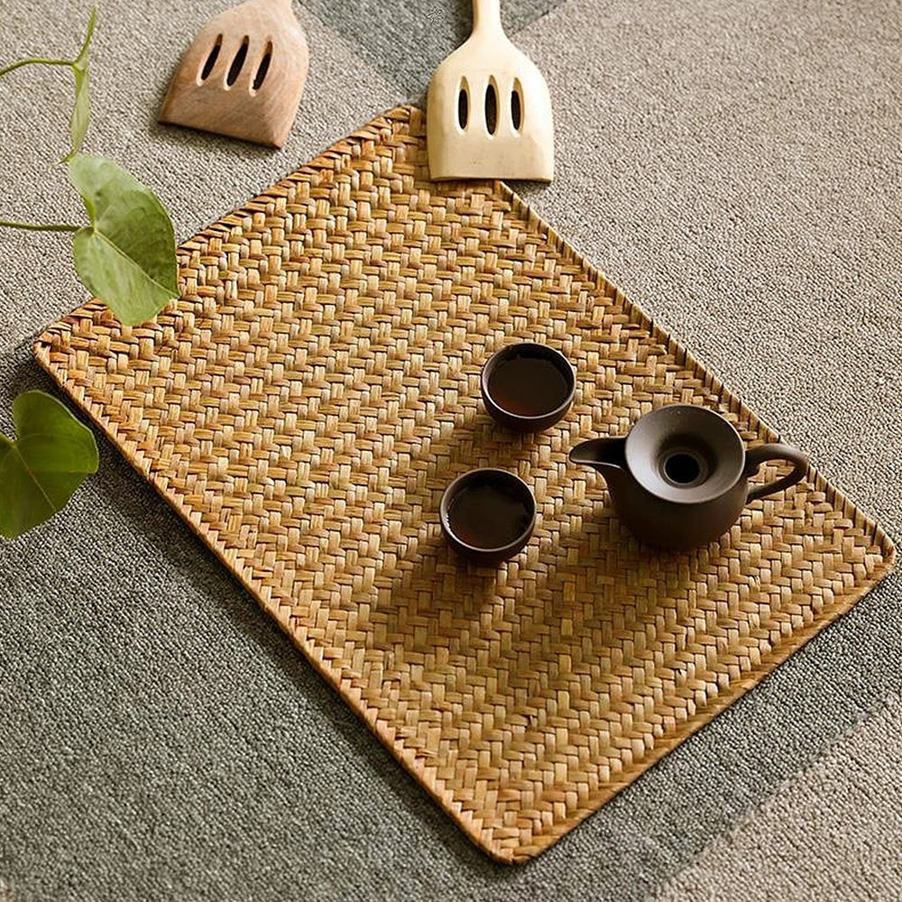 Rectangular handwoven seagrass placemat – shown in a room setting