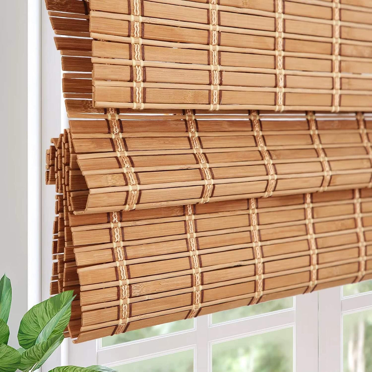 Hand-woven bamboo privacy blind with golden highlights – close-up detail