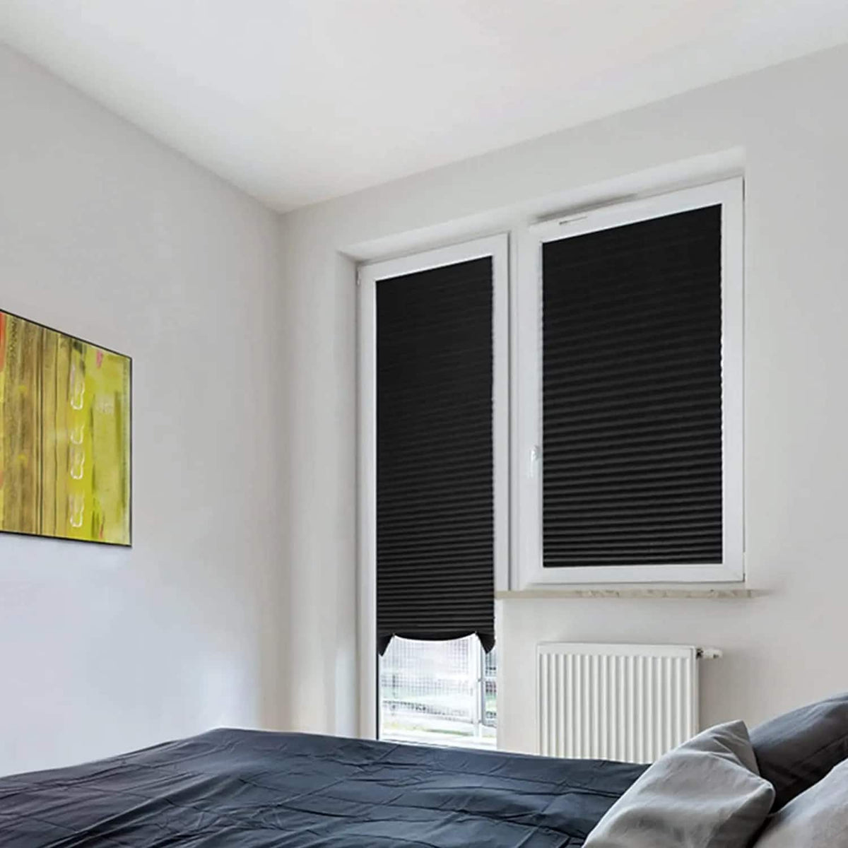 Black bamboo-look fabric curtain with loops – shown in a room setting