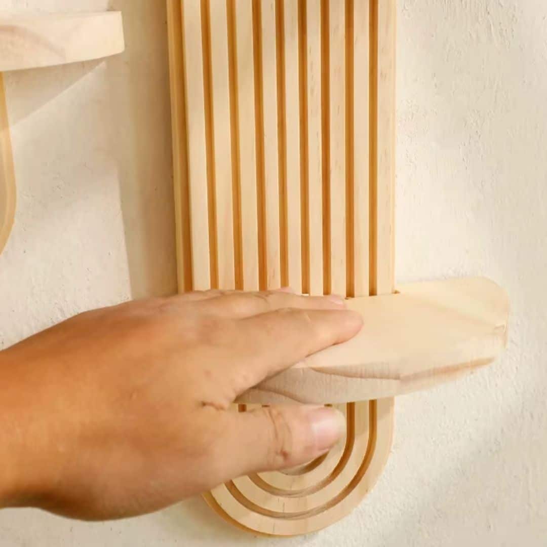 Boho fluted wooden wall decor with fine grooves – shown in use